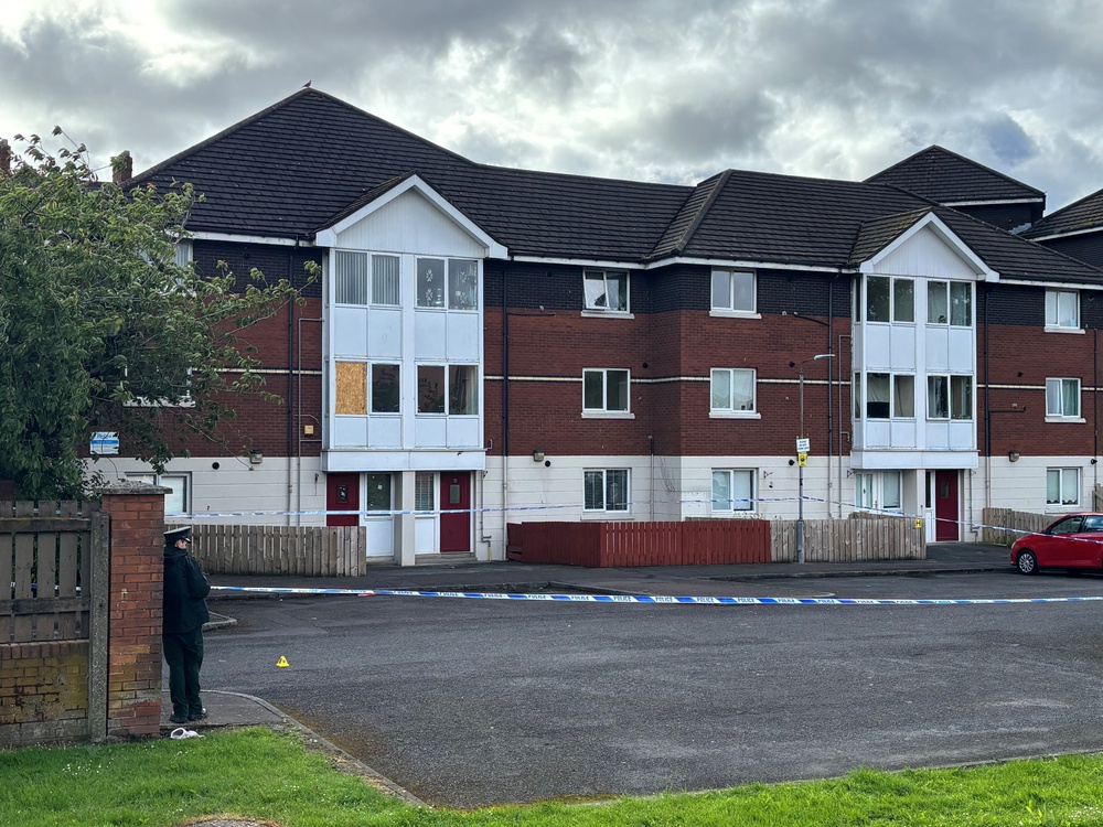 A police cordon at the scene of a stabbing outside apartments in the Kinnaird Avenue area of north Belfast (Rebecca Black/PA) (PA Wire)