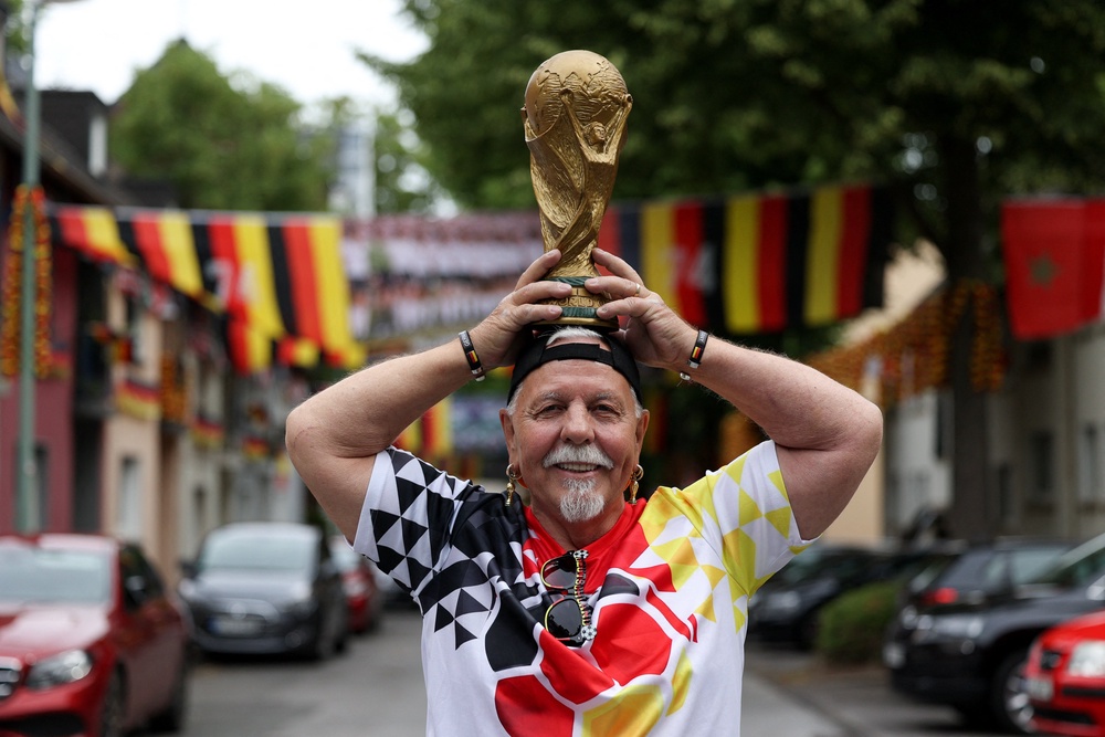 This Germany fan and many others will be keen to see the team add a fifth star to their jersey (Reuters)
