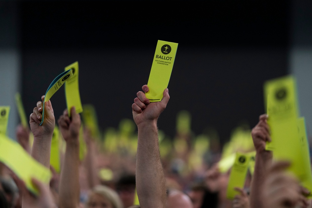 Attendees hold up their ballots during the Southern Baptist Convention's annual meeting in Anaheim in 2022 (Copyright 2022 The Associated Press. All rights reserved)
