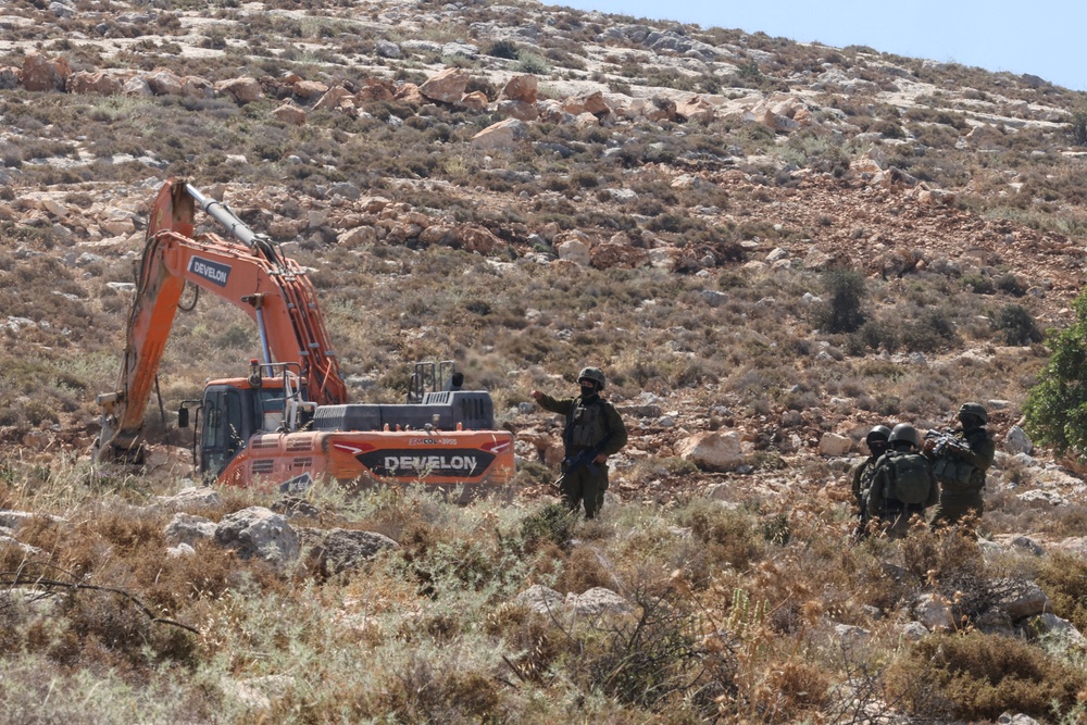 Palestinians had gathered in protest against land confiscations near the village of Dura (AFP/Getty)