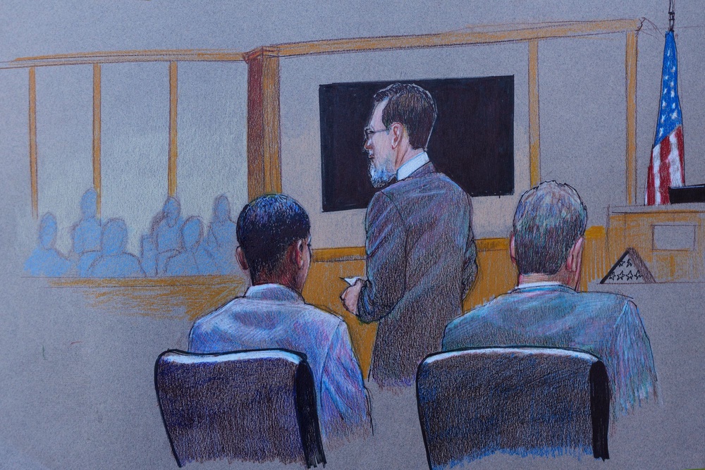 A courtroom sketch shows Mike Howard, standing, a defense attorney and Karmelo Anthony, left front, sitting at the defense table in opening arguments Thursday, June 4, 2026, in McKinney, Texas (AP)