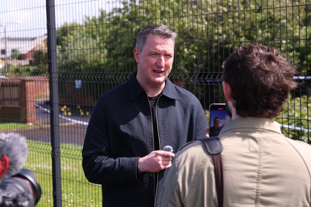 North Belfast MP John Finucane speaking to the media at the scene (Liam McBurney/PA) (PA Wire)