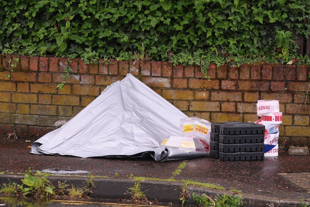 Police equipment at the scene of a stabbing outside apartments in the Kinnaird Avenue area of north Belfast (Liam McBurney/PA) (PA Wire)
