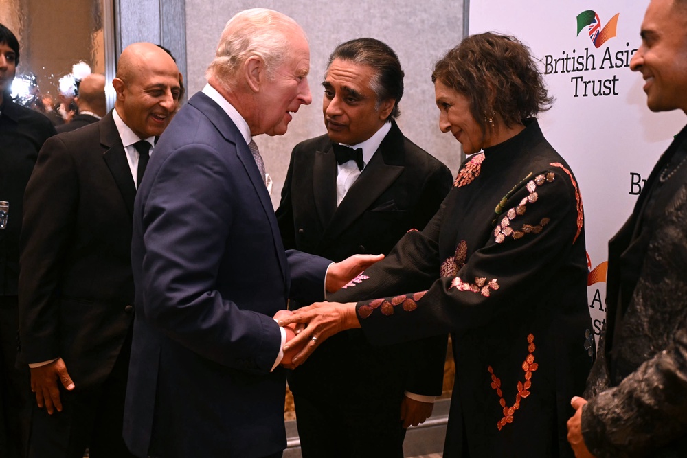 Charles greets Meera Syal and Sanjeev Bhaskar at the reception to celebrate the British Asian Trust (Justin Tallis/PA) (PA Wire)