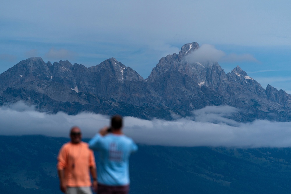 Tourists take photos in Grand Teton National Park in Wyoming (Copyright 2022 The Associated Press. All rights reserved)
