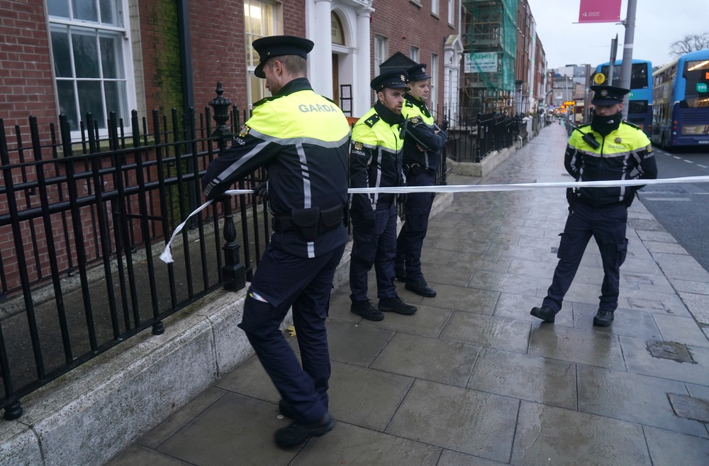 Garda at the scene in Parnell Square East following the attack (PA) (PA Archive)