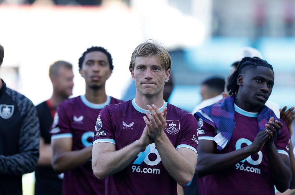 Burnley applaud their fans after relegation back to the Championship for the 2026/27 season (PA)