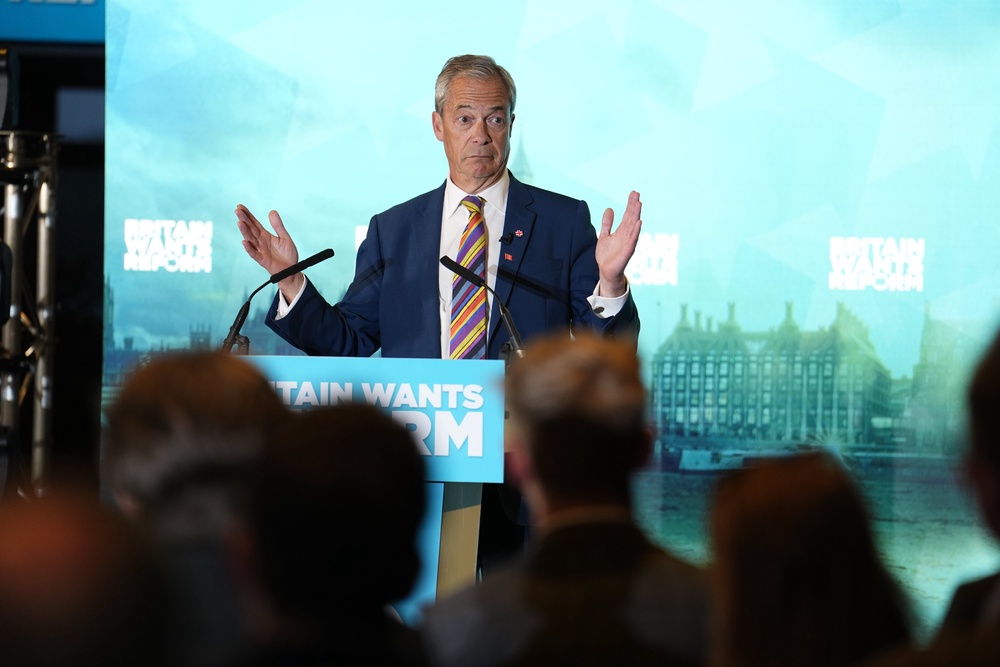 Reform UK leader Nigel Farage speaks to supporters in May (PA) (PA Wire)
