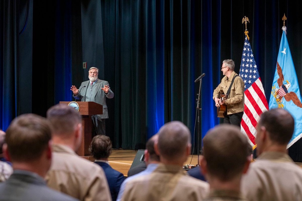 Doug Wilson, left, preaches during a Pentagon prayer service hosted by Hegseth on Feb. 17, 2026, in Washington (DOW Rapid Response/X)