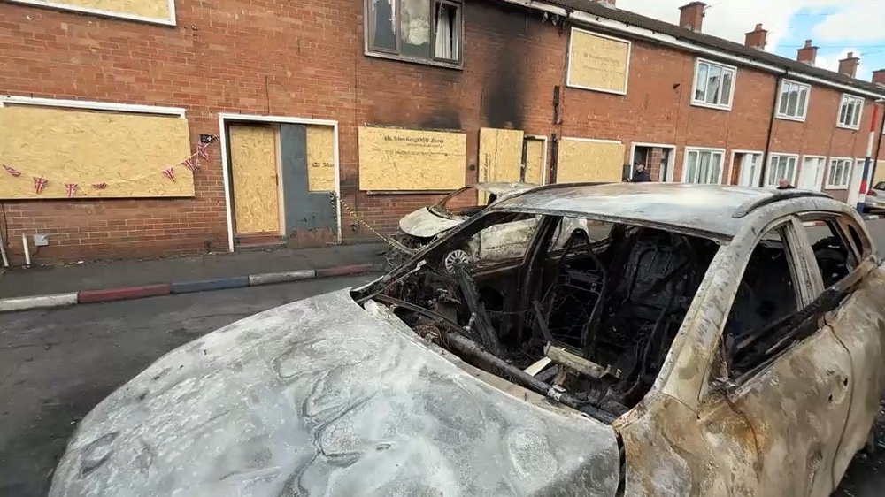 Homes and cars were burnt (Sam Kiley)
