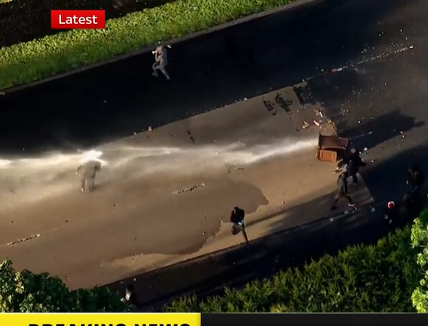 Water cannon hits a youth (Sky News)
