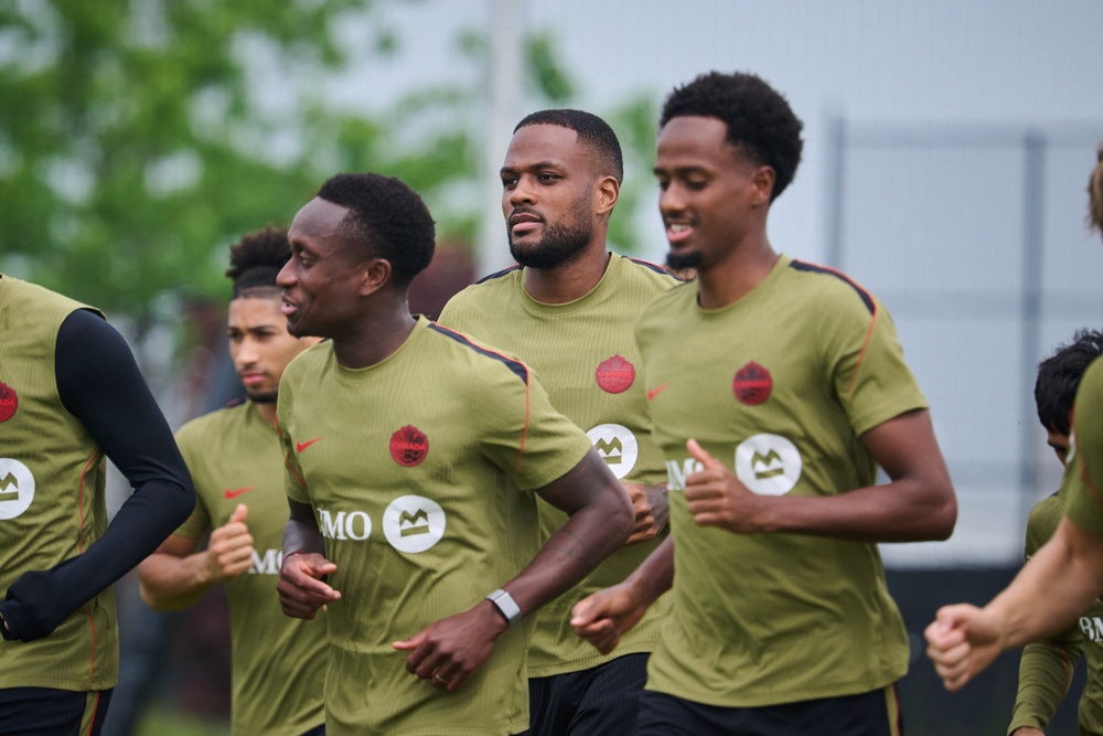 Canada warm up before a training session in Toronto (AP)