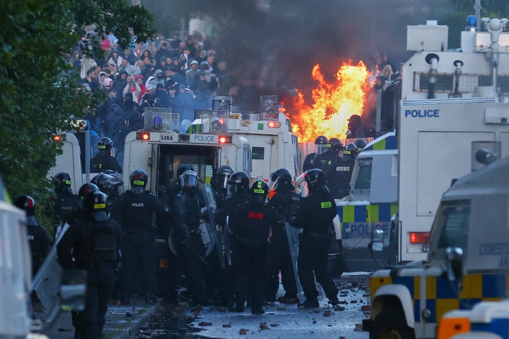 Police attempt to clear protesters near Newtownabbey, northwest Belfast, Northern Ireland, on Wednesday night (AP)