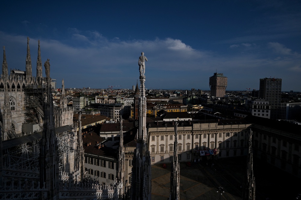 Milan's skyline is seen from the terrace of Duomo Cathedral in Milan (AFP/Getty)