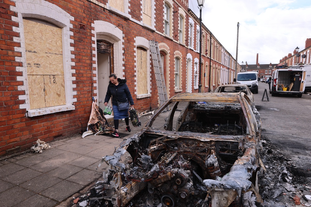 Burned out cars and boarded up houses on McMaster Street in east Belfast after violence erupted on Tuesday night (Liam McBurney/PA) (PA Wire)