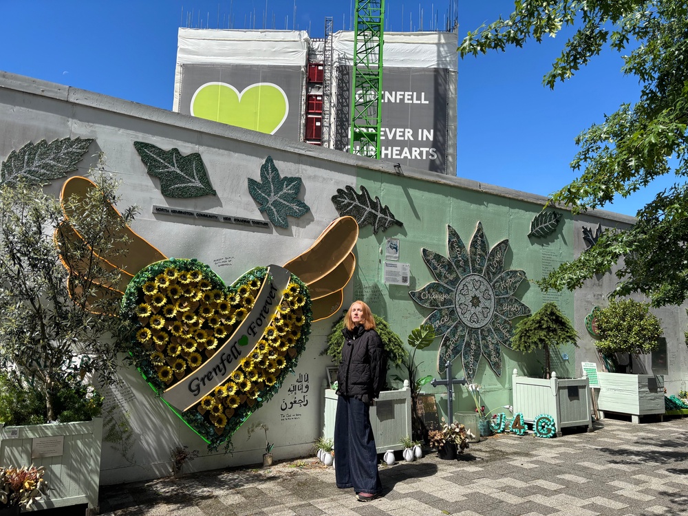 Melanie Juno Wolf at the Grenfell Tower memorial wall (The Independent)