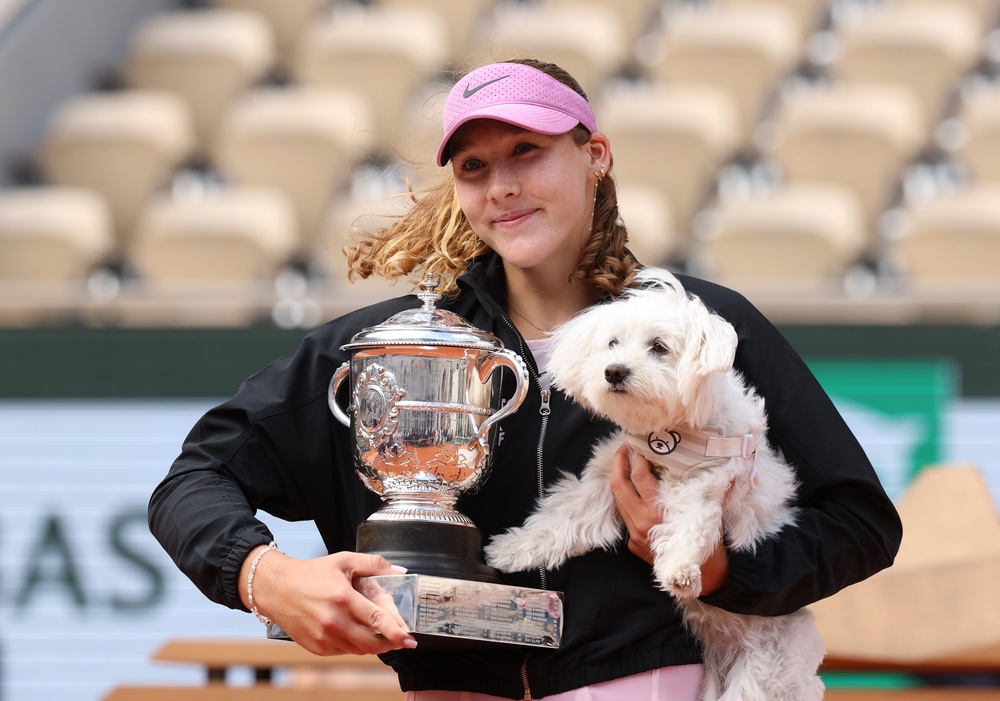 Andreeva celebrated her French Open title with her coach Conchita Martinez’s puppy Luna (Getty)