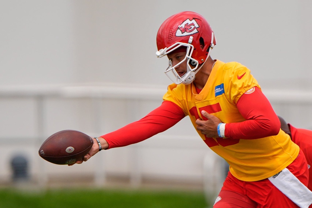 Kansas City Chiefs star quarterback Patrick Mahomes is poised to become the first NFL player to have a contract worth more than $500m (AP)