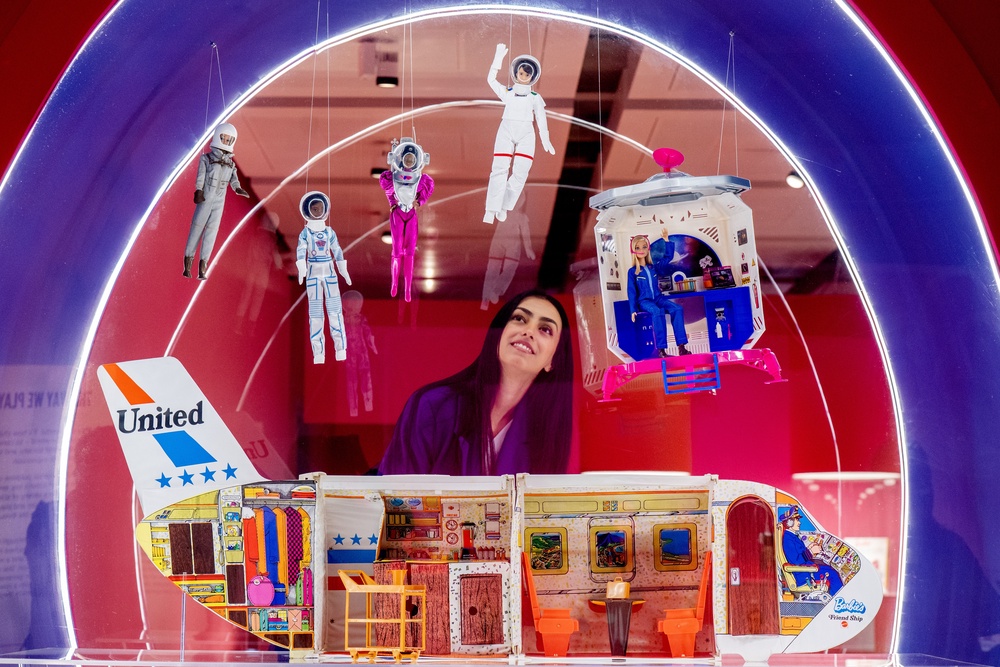 Airline Barbie and space Barbie dolls are among the items on display (Jane Barlow/PA) (PA Wire)