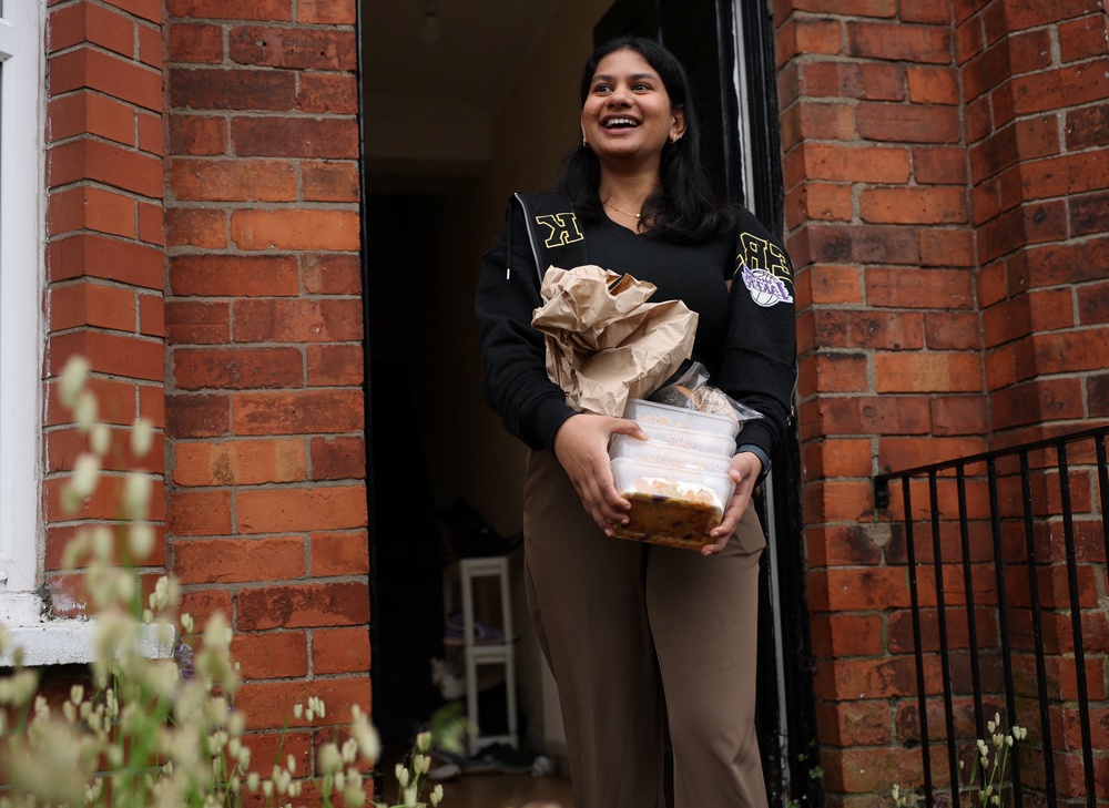 Ruchira Rangaprasad delivers food to vulnerable migrants, following a knife attack that sparked a wave of protests (Reuters)