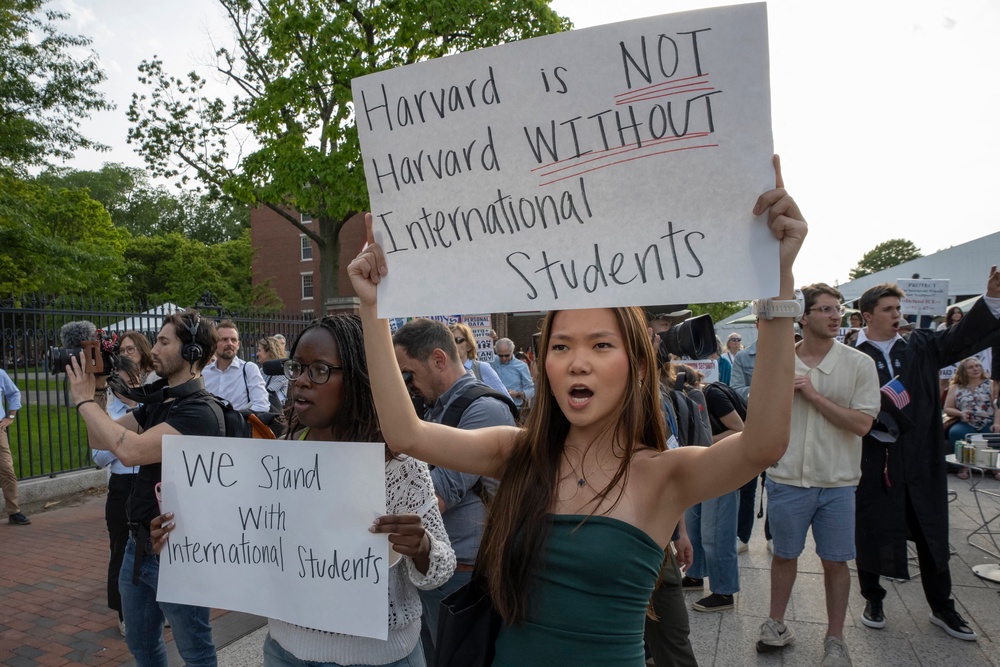 Recent Trump administration restrictions on immigration have already reduced the pipeline of foreign students. Pictured here, people hold up signs during the Harvard Students for Freedom rally in support of international students at the Harvard University campus on May 27, 2025 (AFP via Getty Images)