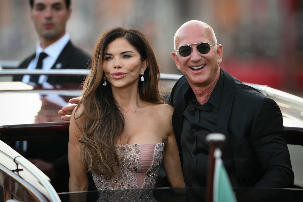 Bezos and wife Lauren Sanchez Bezos leave the Aman Hotel on the third day of their wedding festivities in Venice, Italy, on June 28, 2025 (AFP/Getty)