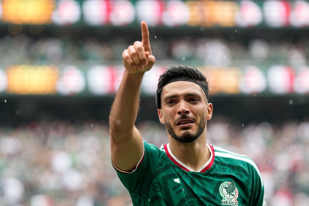 Jimenez celebrates after scoring his side's second goal (AP)
