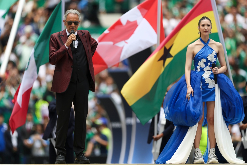 Andrea Bocelli and EJAE perform one of the tournament's official anthems. (Getty)