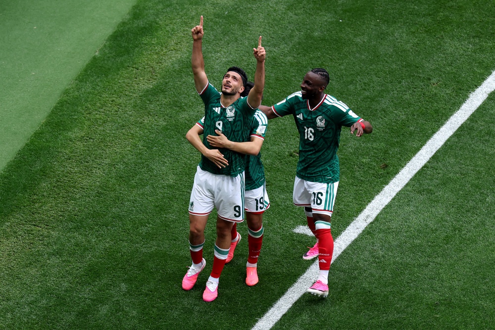 Jimenez celebrates scoring Mexico's second against South Africa (Getty)