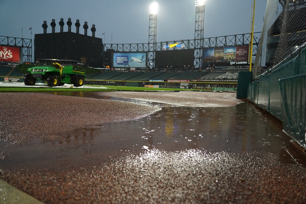 Puddles over the field as a severe thunderstorm rolled into the area before a baseball game between the Chicago White Sox and the Atlanta Braves (AP)