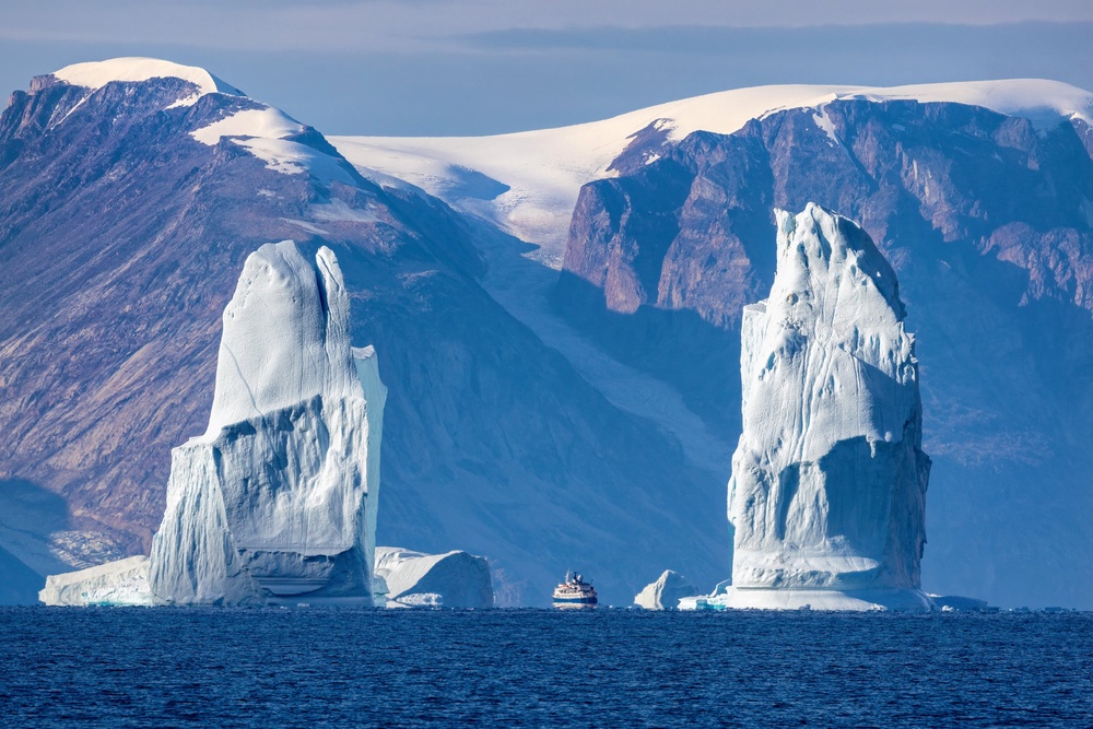 This solar eclipse cruise will visit the towering icebergs of Scoresby Sund, Greenland (Getty Images)