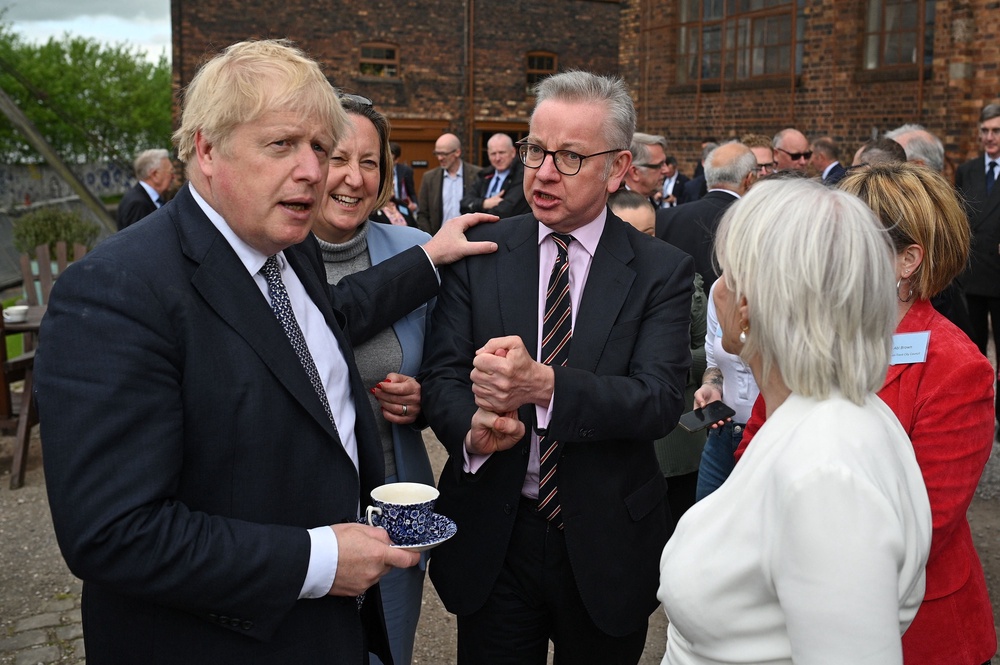 Boris Johnson with ministers after a cabinet meeting in Stoke (AFP/Getty)