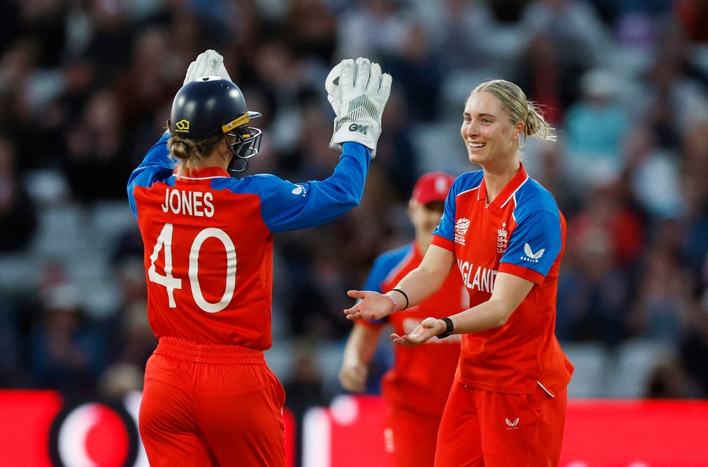 England's Freya Kemp celebrates with Amy Jones after taking the wicket of Sri Lanka's Chamari Athapaththu (Reuters)