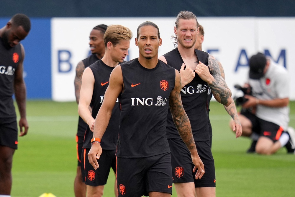 Netherlands’ Virgil van Dijk, Frenkie de Jong and Wout Weghorst during training (Reuters)