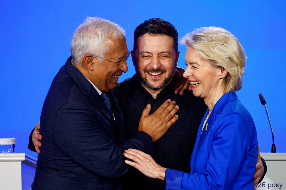 Ukraine's President Volodymyr Zelenskiy, European Commission President Ursula von der Leyen and European Council President Antonio Costa react as they attend a press conference (Reuters)