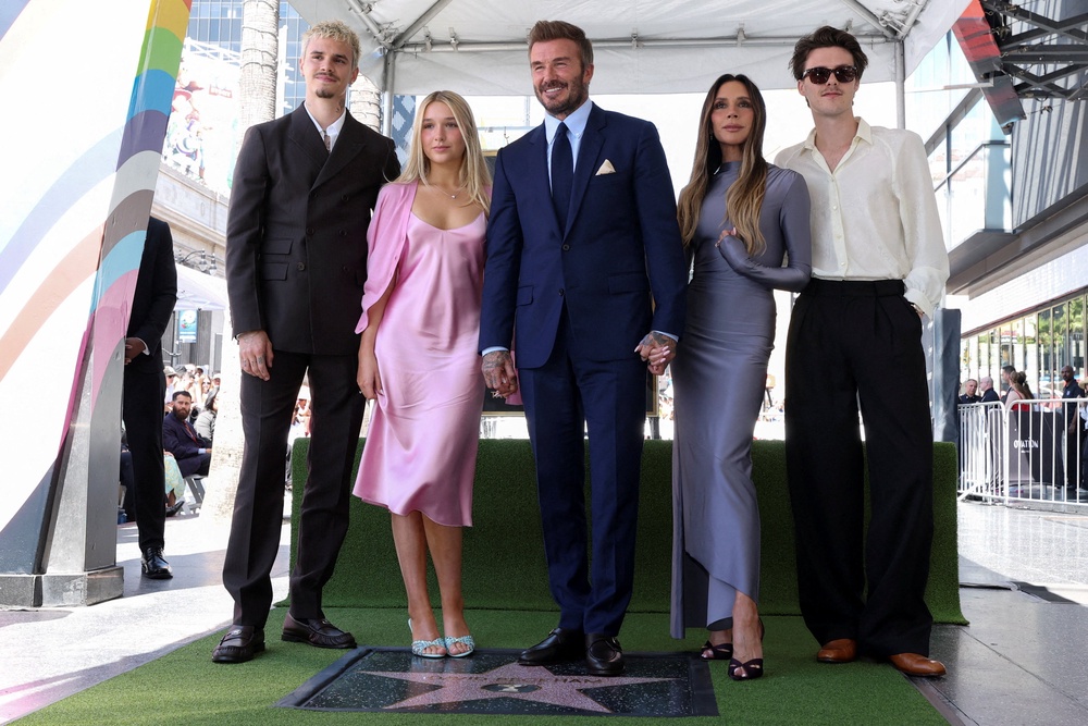 The Beckhams (sans Brooklyn) were out in force as David received a Hollywood Walk of Fame star last week (Reuters)