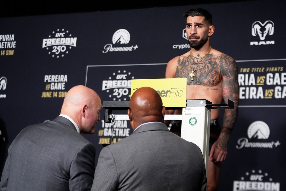 Ilia Topuria weighing in for the UFC Freedom 250 event (AP)