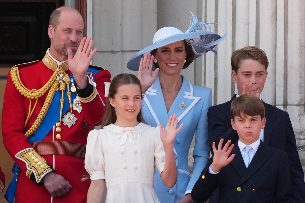 William, Kate and their children waved to the crowd from the Buckingham Palace balcony (AP)