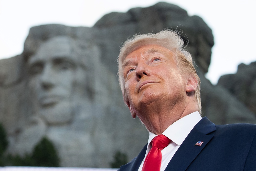 Trump signed an executive order aiming to ‘restore truth and sanity to American history’ last year (AFP via Getty Images)