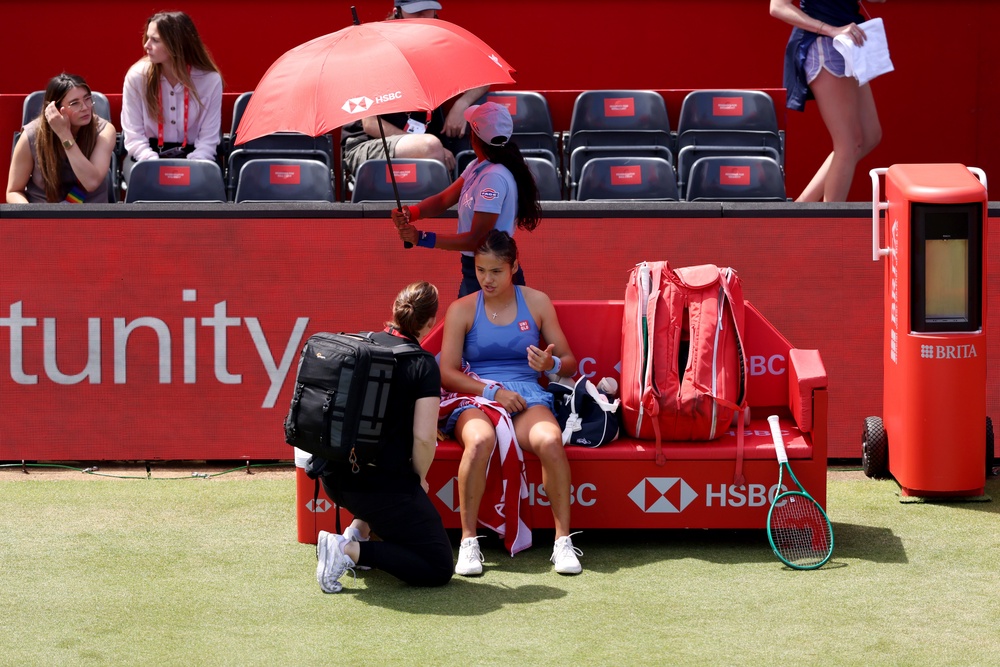Emma Raducanu speaks to medical staff after slipping on court against Kamilla Rakhimova (Getty)