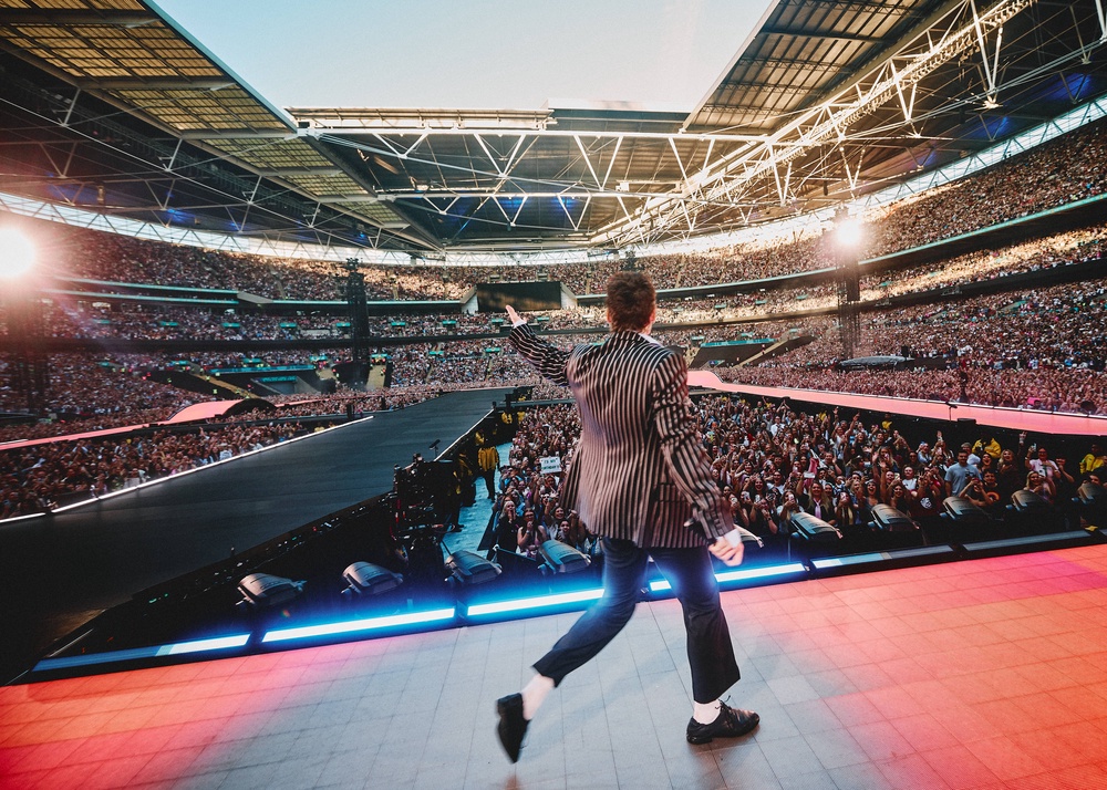 Dance more: Styles does a lap at Wembley Stadium (Anthony Pham)