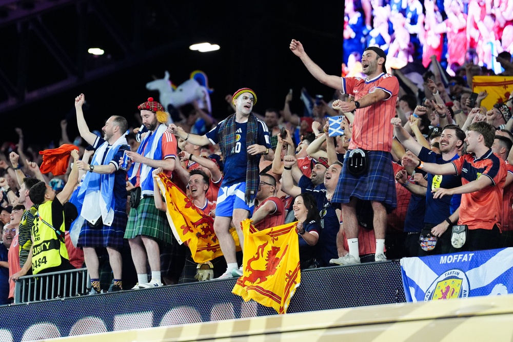 Scotland fans following the FIFA World Cup Group C match at the Boston Stadium (PA)