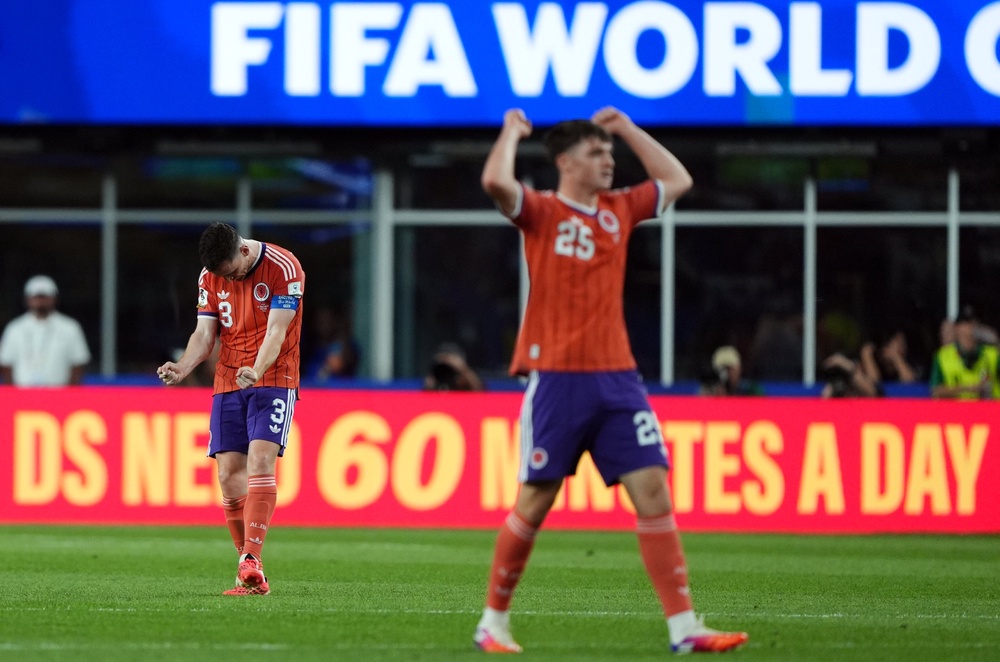 Scotland's Andy Robertson and Findlay Curtis celebrate (PA)