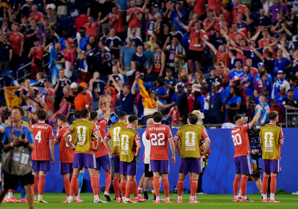 The win takes Scotland top of Group C with one game played (Reuters)