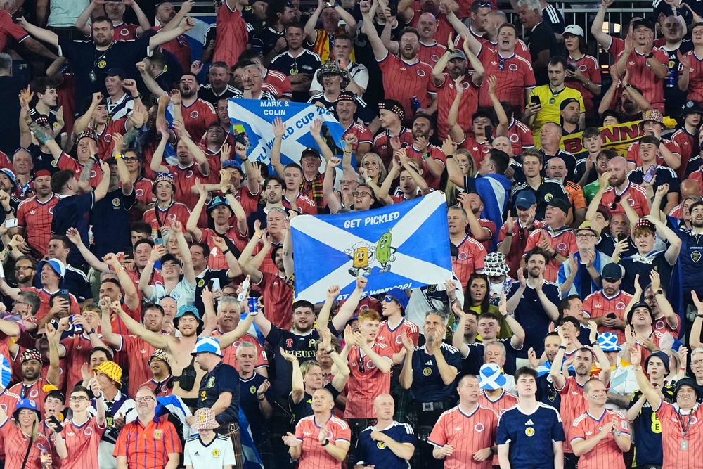 Scotland fans react following their World Cup Group C win (AP)