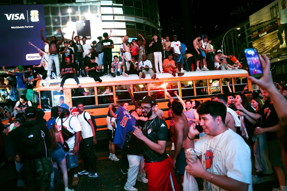New York Knicks fans celebrate their victory after Game 5 of the NBA Finals basketball series against the San Antonio Spurs (AP)