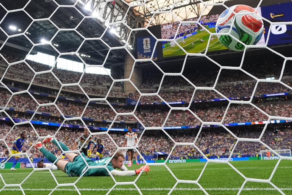 Manuel Neuer is beaten in the Germany goal (AP)