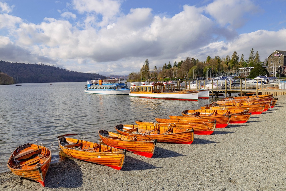 Rowing boats on the shore of Lake Windermere (Cumbria Tourist Board)