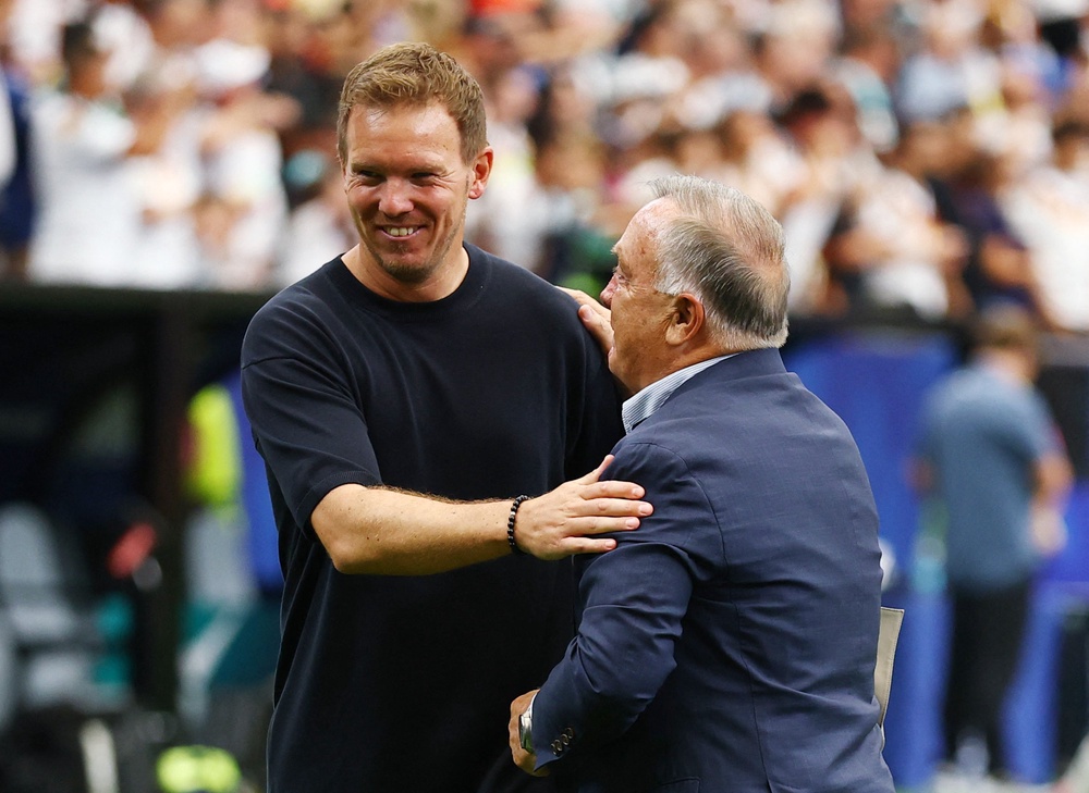 Julian Nagelsmann is congratulated by Curacao coach Dick Advocaat (Reuters)