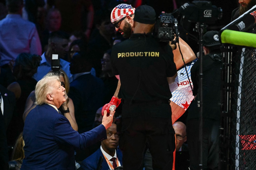 President Donald Trump shakes hands with America's Josh Hokit during the UFC Freedom 250 (AFP/Getty)